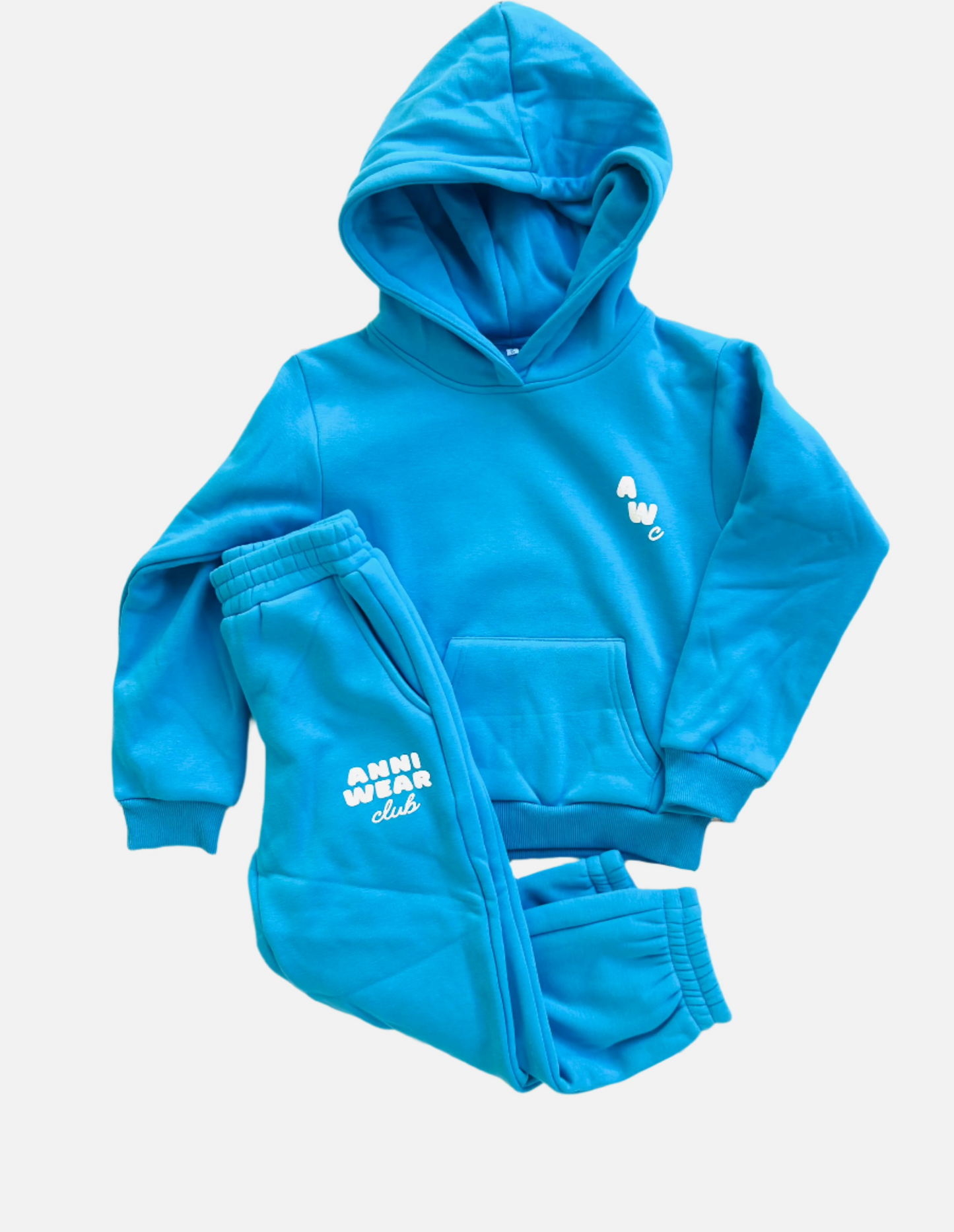 Blue children's hoodie and trackpant set on a white wooden floor