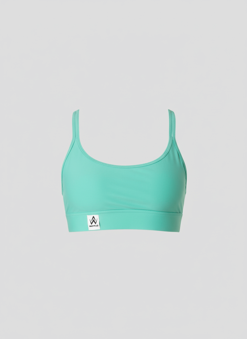 Green sports bra with a brand logo on a light gray background