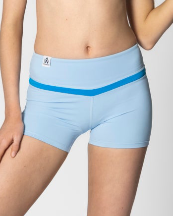 Light blue sportswear shorts with a blue waistband on a plain background