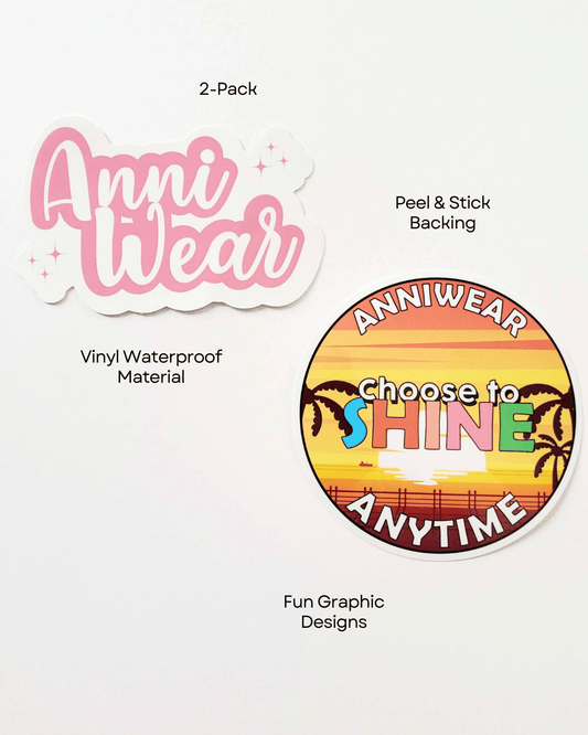 Two stickers from Anni Wear on a white background, one with pink text and the other with a colorful 'Choose to Shine' design.