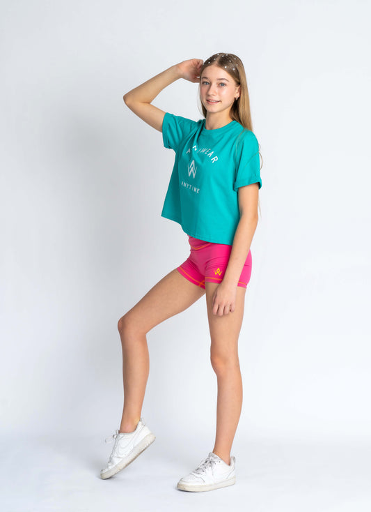 Teal t-shirt with 'ANNIWEAR ANYTIME' text and logo on a plain background