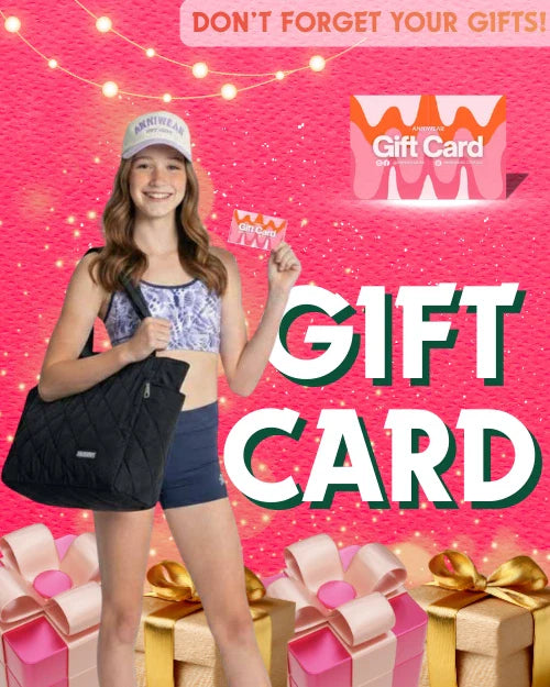 a promotional cover of  the gift card collection with a girl wearing purple and blue activewear posing with a black bag and a gift card on a pink festive background with gifts