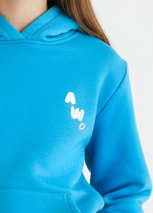 Blue hoodie with a white logo worn by a person