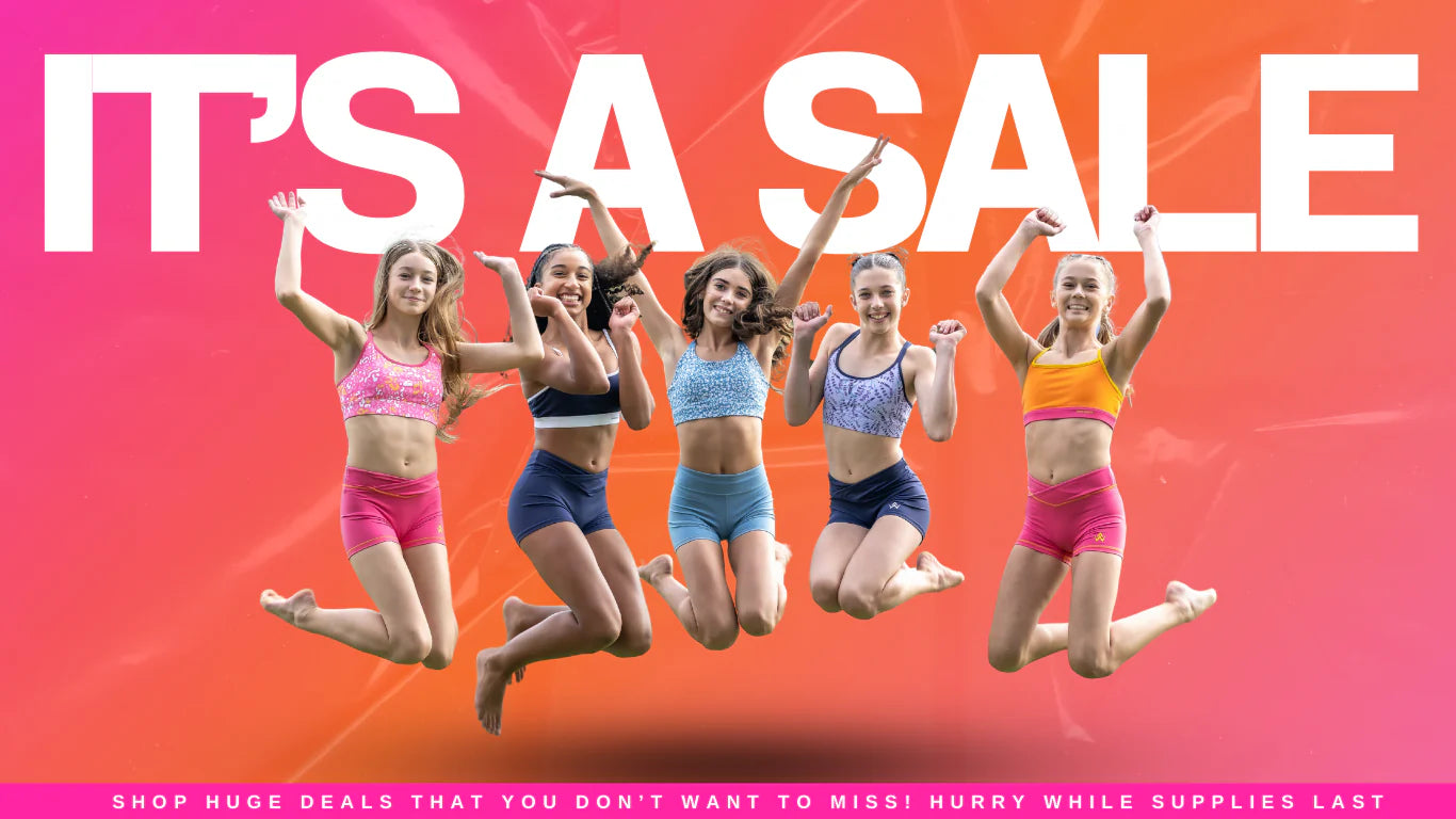 five teens in a jump shot wearing colorful best selling activewear sets.
