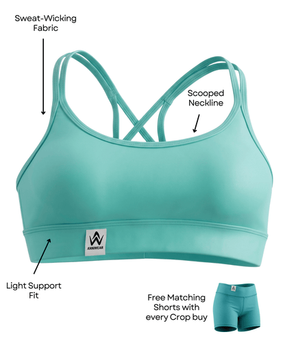 Teal sports bra with features labeled on a white background