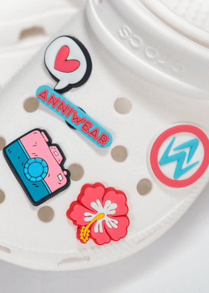 Colorful shoe charms with 'ANNIWEAR' branding on a white background