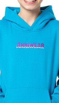 Person wearing a blue hoodie with 'Anniwear' logo