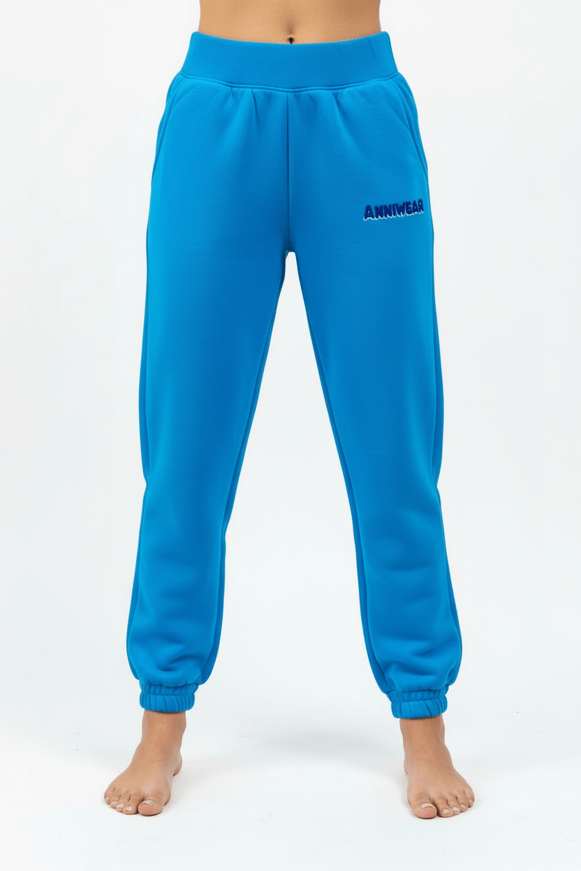 Blue sweatpants with a brand logo on a white background
