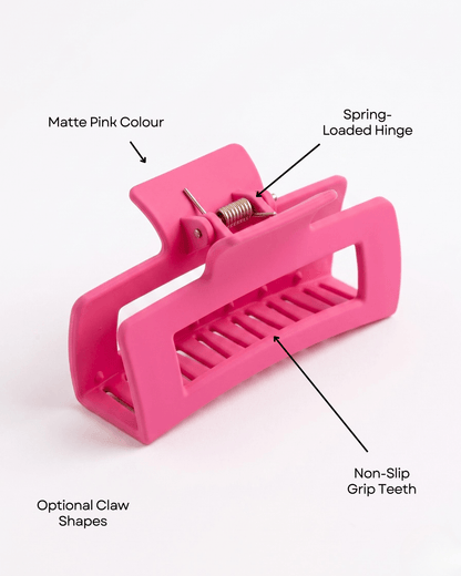 Pink hair clip with labeled features on a white background