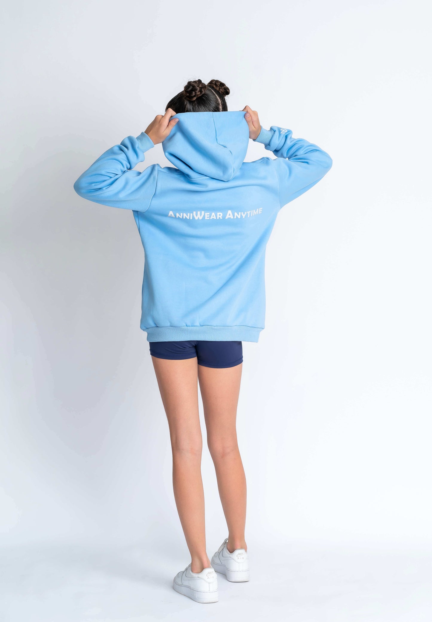 Light blue hoodie with 'ANNIWEAR ANYTIME' logo on a white background