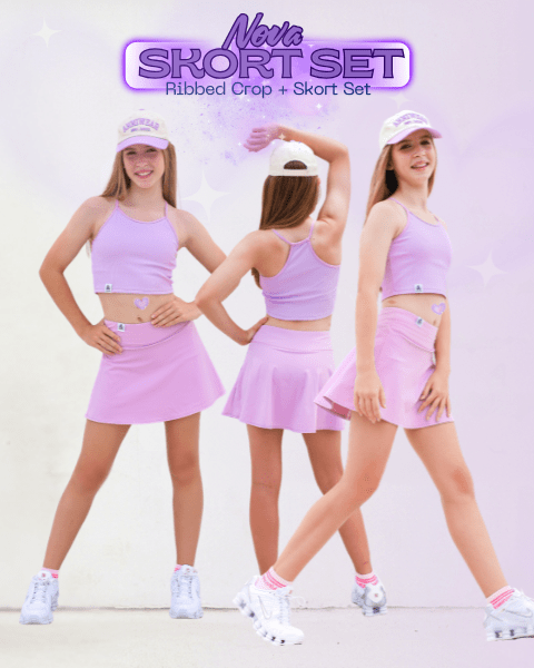 Three models wearing a pink athletic outfit with a visor on a light gray background.