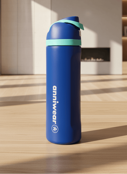Blue water bottle with Blue cap on a wooden surface