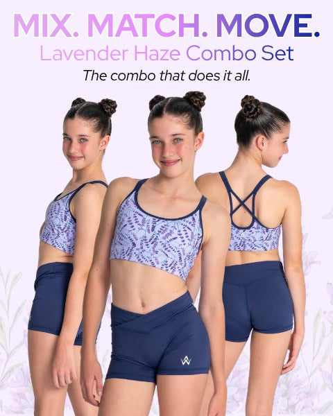 Three young gymnasts modeling a lavender and navy athletic set against a light lavender background with promotional text at the top. The set includes a patterned sports bra and navy shorts.