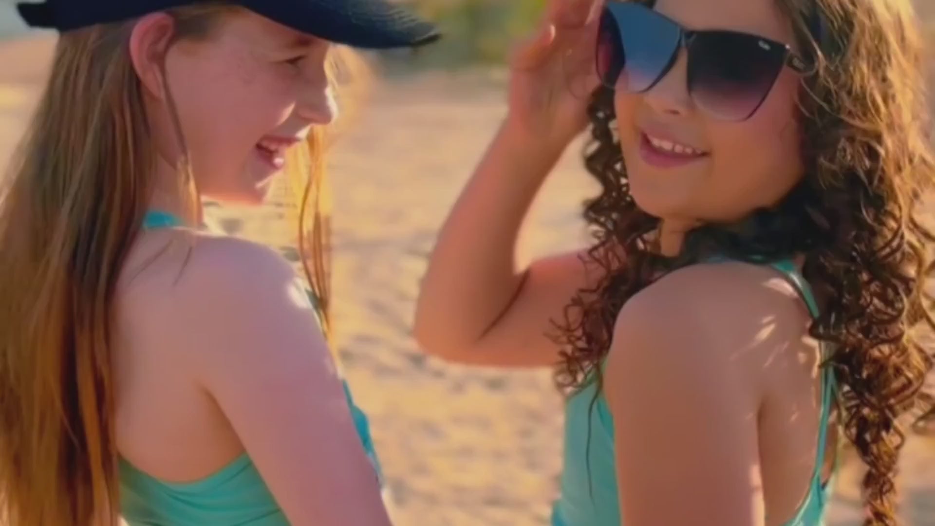 Load video: happy, confident and talented girls wearing colorful Anniwear activewear in different locations with the bestselling cloud duffel bag.