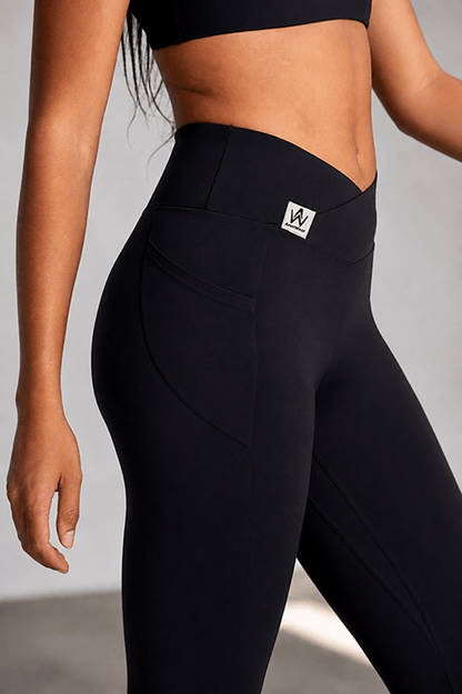 Black leggings worn by a person on a white background