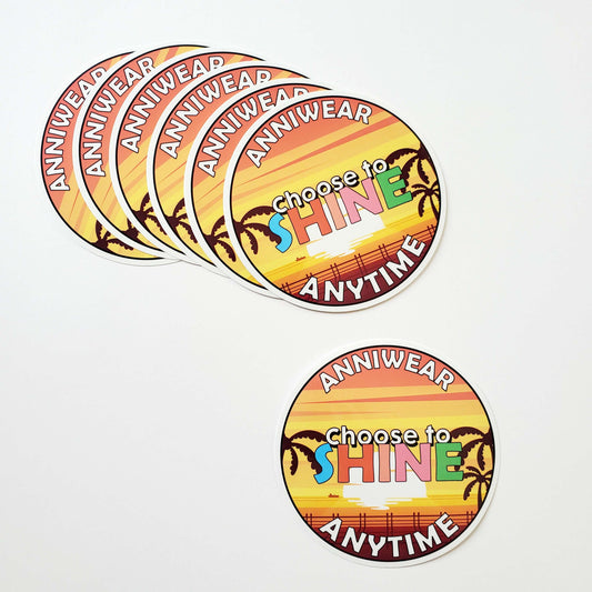 Colorful sticker with 'choose to SHINE ANYTIME' text and palm tree design on a white background